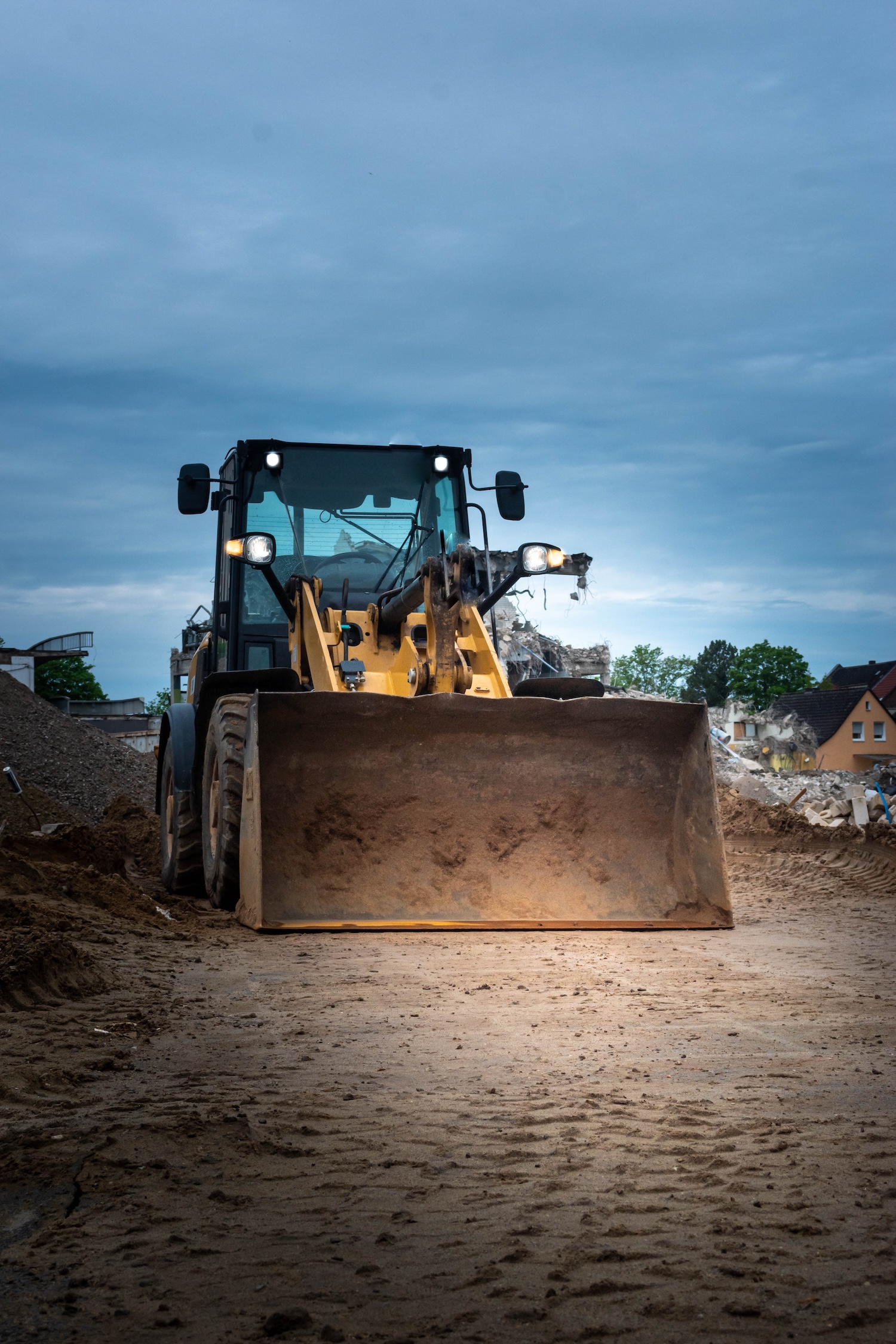 Vertical shot of a bulldozer on a construction site A vertical shot of a bulldozer on a construction site